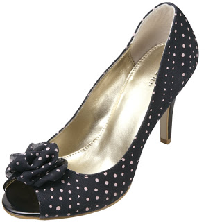 Heels with polka dots and a bow.
