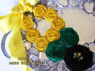 A yellow and green floral necklace.