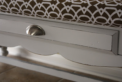 The silver pulls on the updated coffee table.