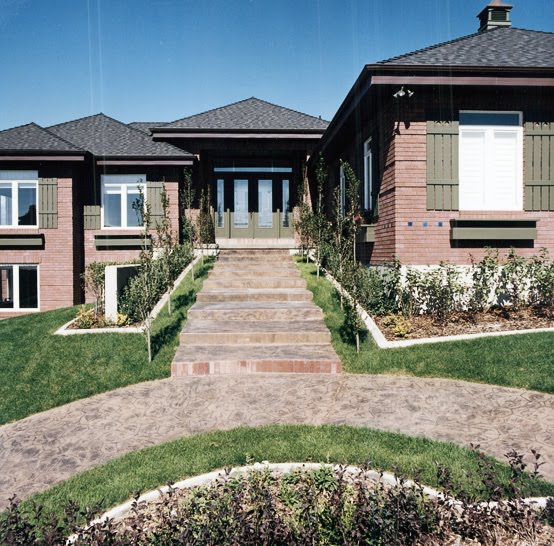 Robert McArthur Studios - Red Brick Home Exterior with Green Shutters