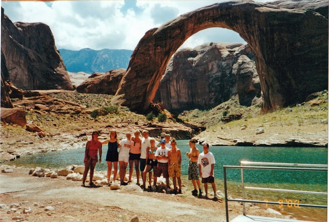 A group of people standing beside Lake Powell.