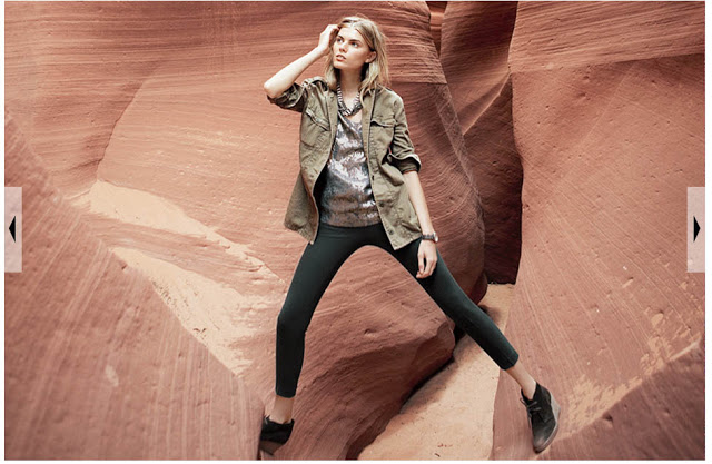 The same model stepping on the rock formations.