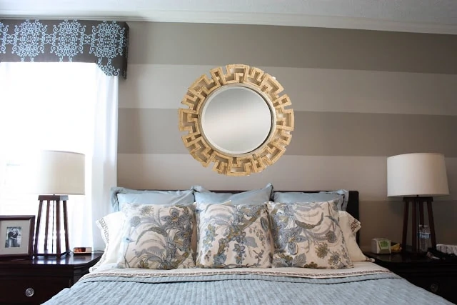 Mirror that is round with a design from Neiman Marcus.