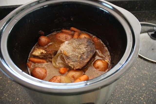 A pot of beef stew on the counter.