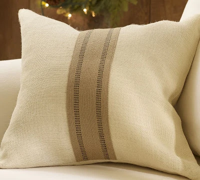 A ribbon on a throw pillow.