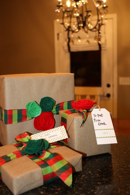 Three presents all wrapped on the table.
