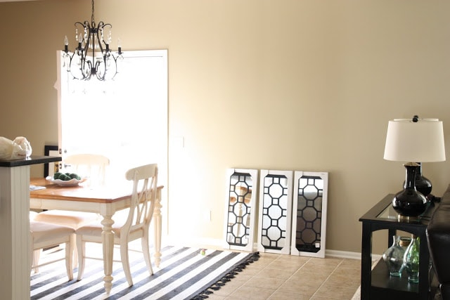New mirrors propped up agains the dining room wall.