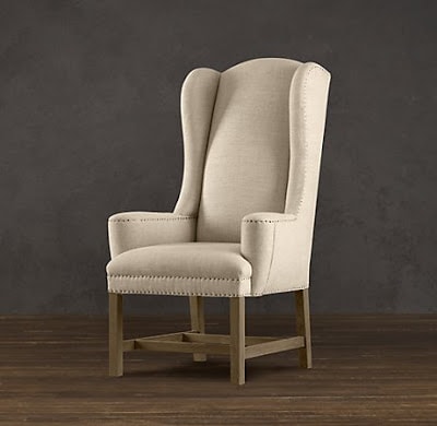 White neutral Restoration Hardware chair.