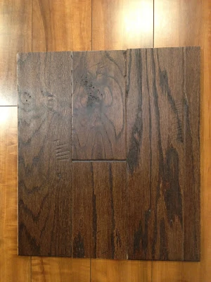 Dark wood floor sample.