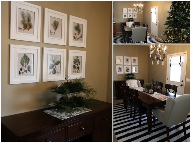 Dining room with chandelier above the table and six framed pictures on the wall above the hutch.
