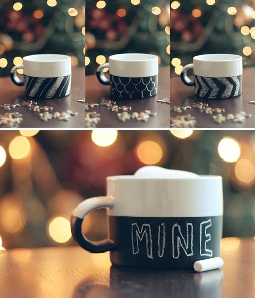 Mugs that are decorated with chalk on the counter.