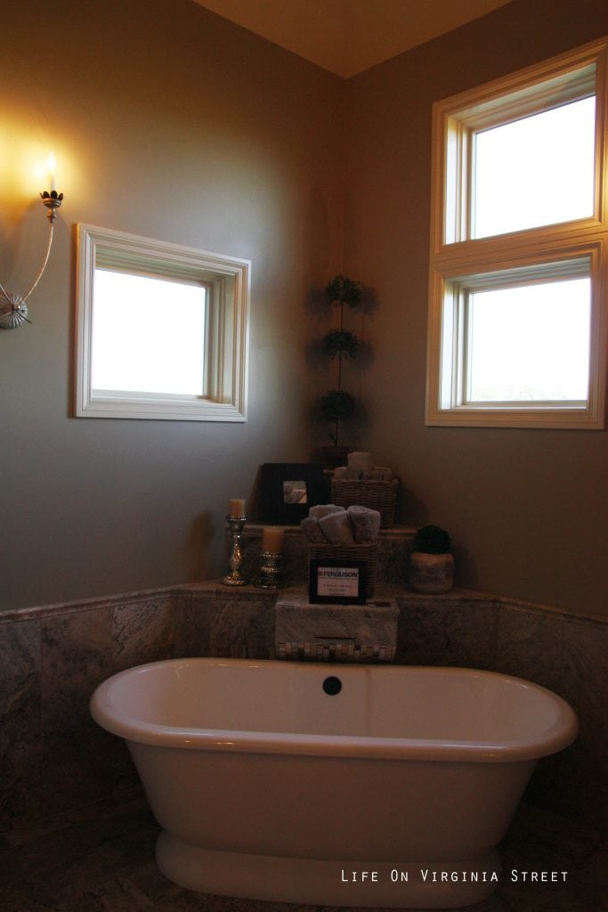 The bathroom in the master bedroom with a soaker tub in the corner.