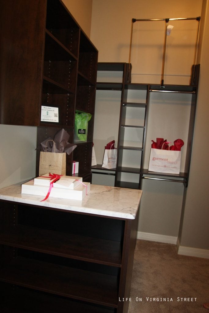 A laundry room with marble countertops.