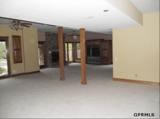 A large open room with wooden beams.