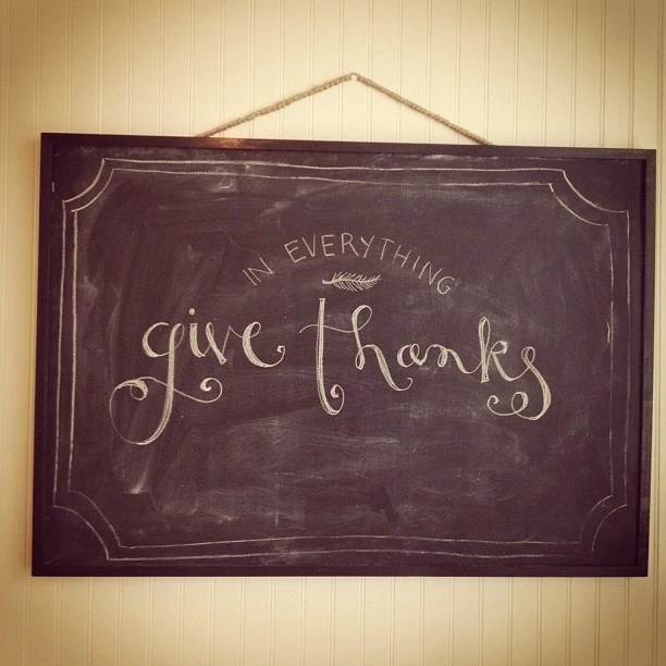 In everything give thanks on chalkboard.