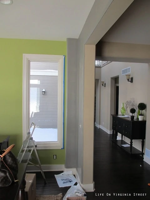 The light green paint in the dining room and a look down the neutral hallway.