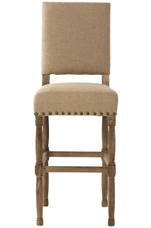 A linen stool and large rivets on the bottom of the seat and wooden legs.