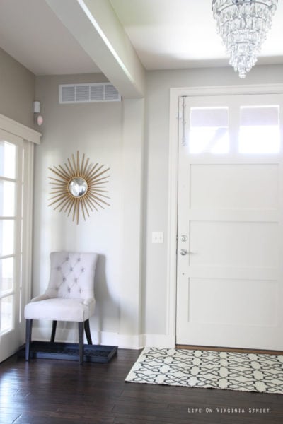 Front entryway door with a surface bolt installed.