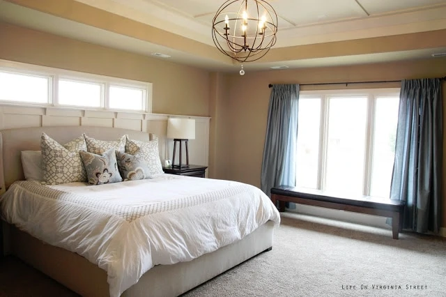 Master Bedroom with Crystorama Orb Light Chandelier installed above the bed.