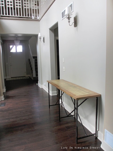 Safavieh Simon Natural Console Table in a Neutral Entryway