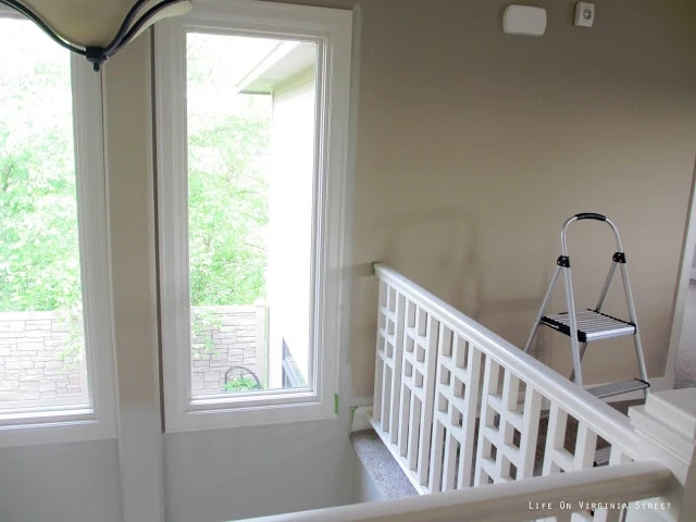Painting the two-story entryway with Behr Castle Path