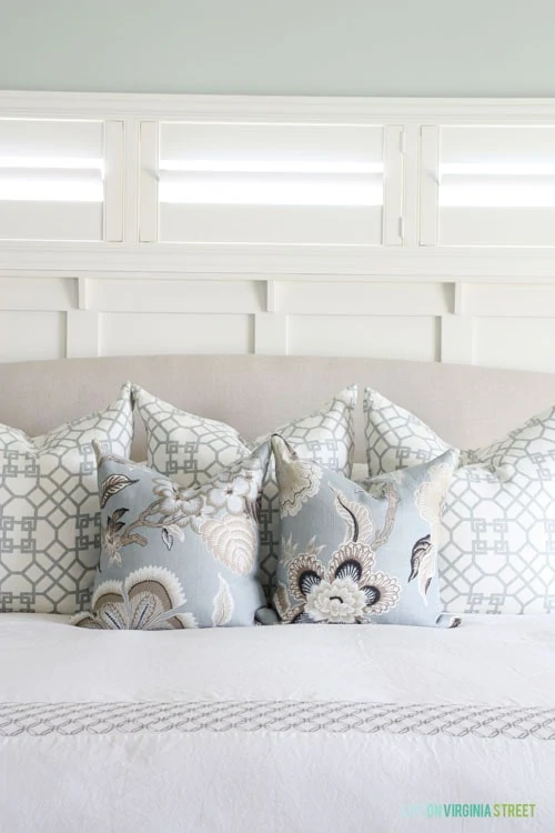 Master bedroom with Sea Salt painted walls, Schumacher Hothouse Flower pillows and Windsor Smith Pelagos shams.