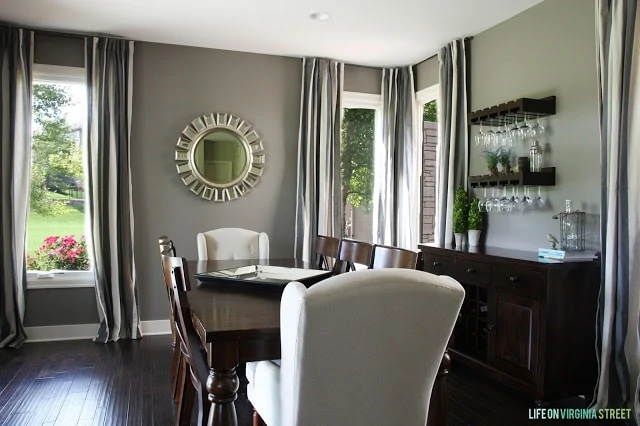 Dining room with charcoal gray walls
