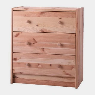 The assembled three drawer dresser.
