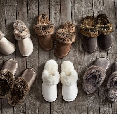 White, gray, dark brown and brown faux fur slippers.