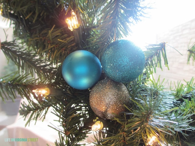 The three ornaments on the the wreath.