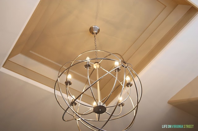 The lights are on the new chandelier.