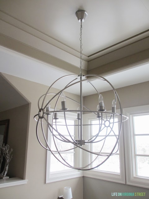 The silver globe lighting.