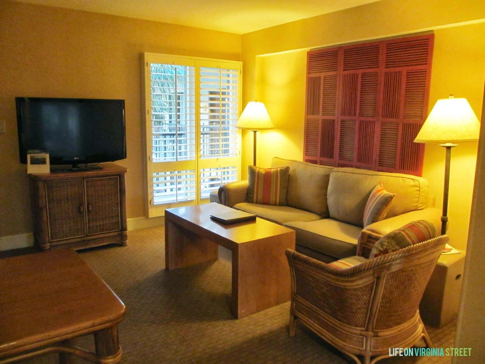 A small sitting room inside the hotel room.