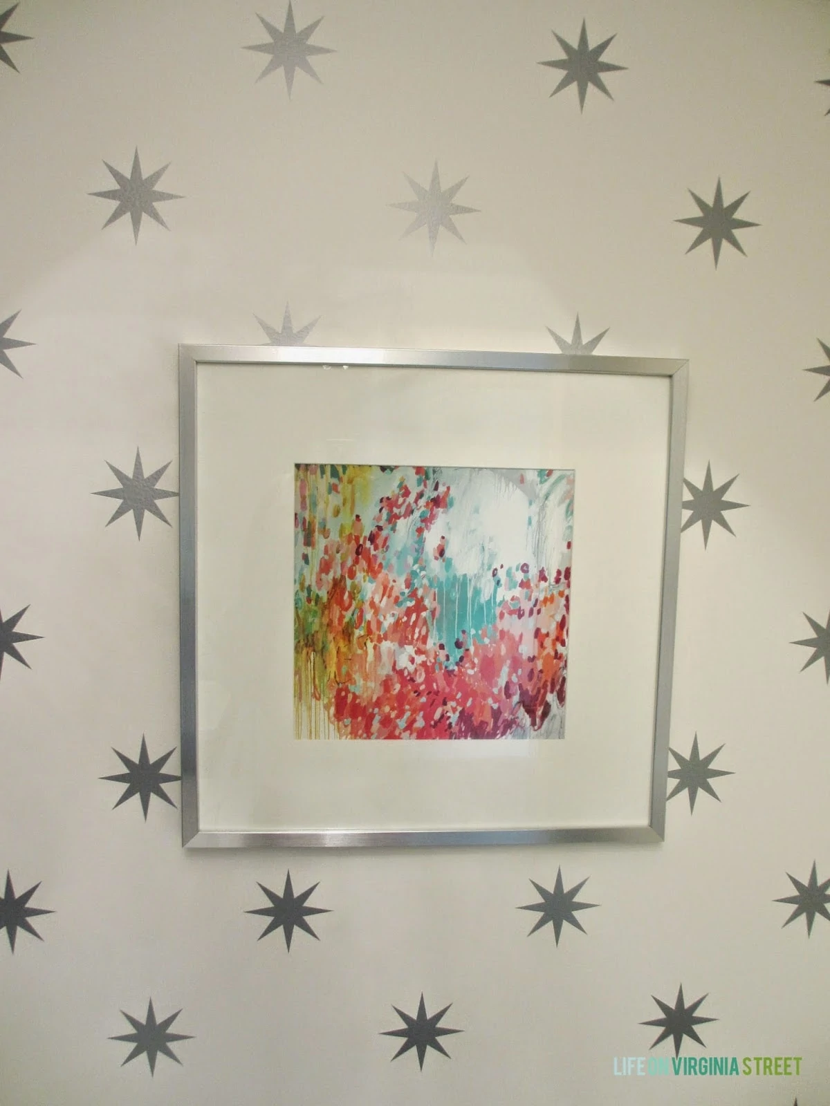 Michelle Armas print in a bright laundry room