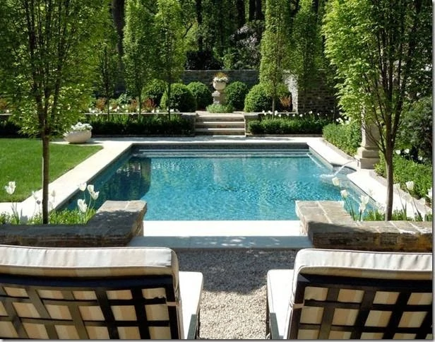 The tiered levels of landscaping around this pool are my favorite design element.