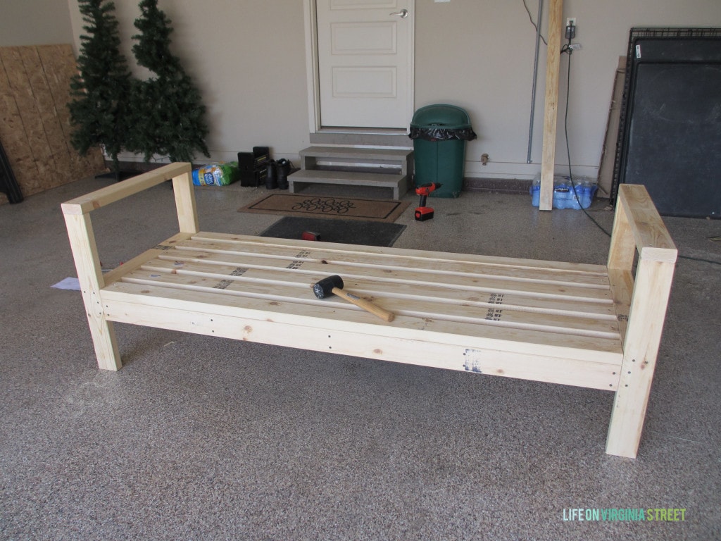 Adding slats to support the cushions of the couch.