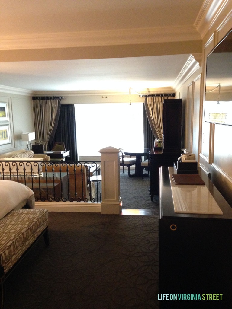 The bedroom area and the lower platform of the sitting area in the hotel.