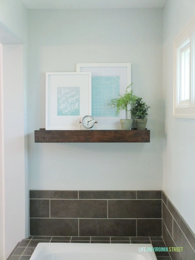 Pottery Barn Rustic Wood Shelf in a Master Bathroom with Light Gray Walls.