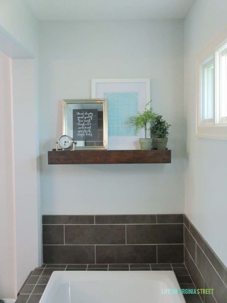 A small clock sits on the ledge.