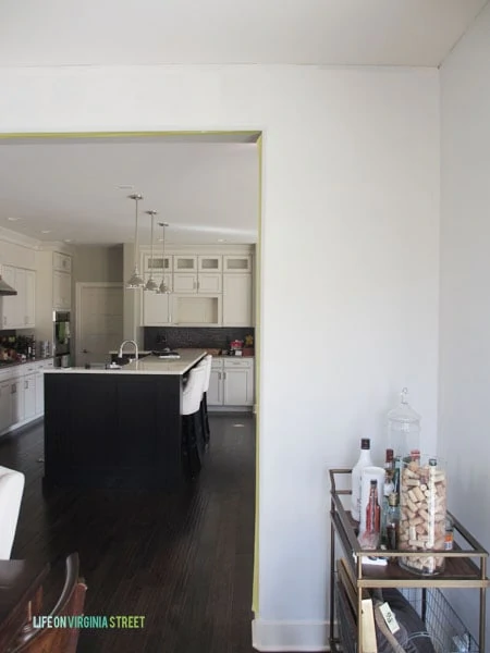Here's how the dining room paint will look when contrasted with the kitchen island.