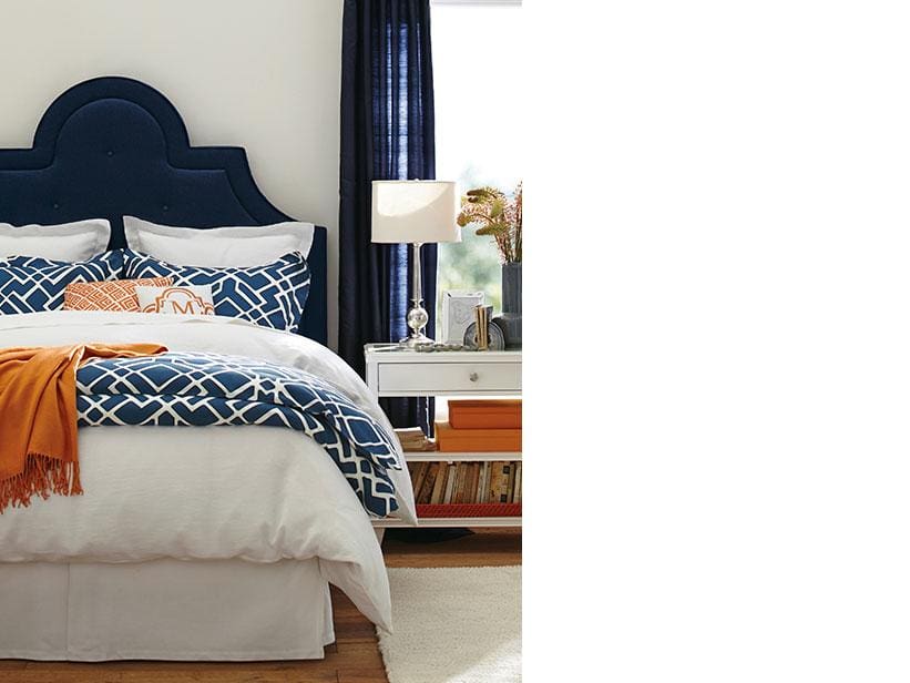 {Love this navy and orange bedroom}