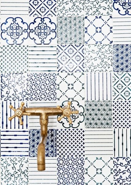 Blue and white concrete tile with many different patterns. 