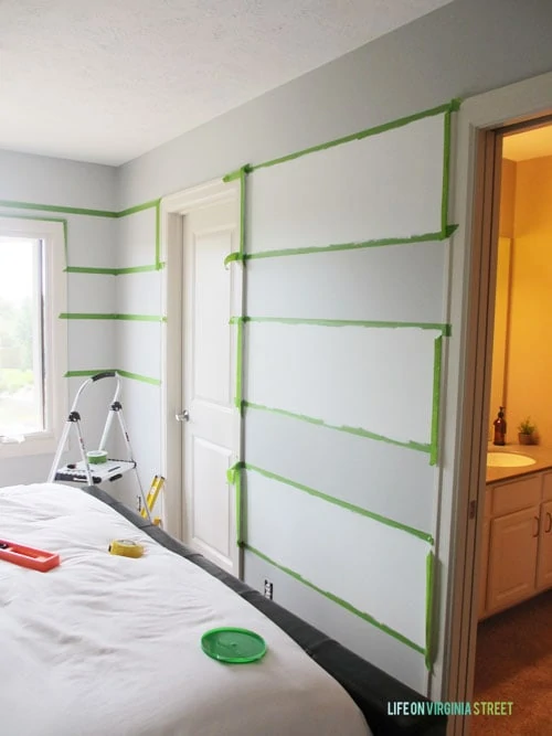 Here's how to tape your stripes to achieve perfectly painted striped walls.  Life on Virginia Street