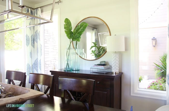 The courtyard view of this light, bright dining room makeover. 