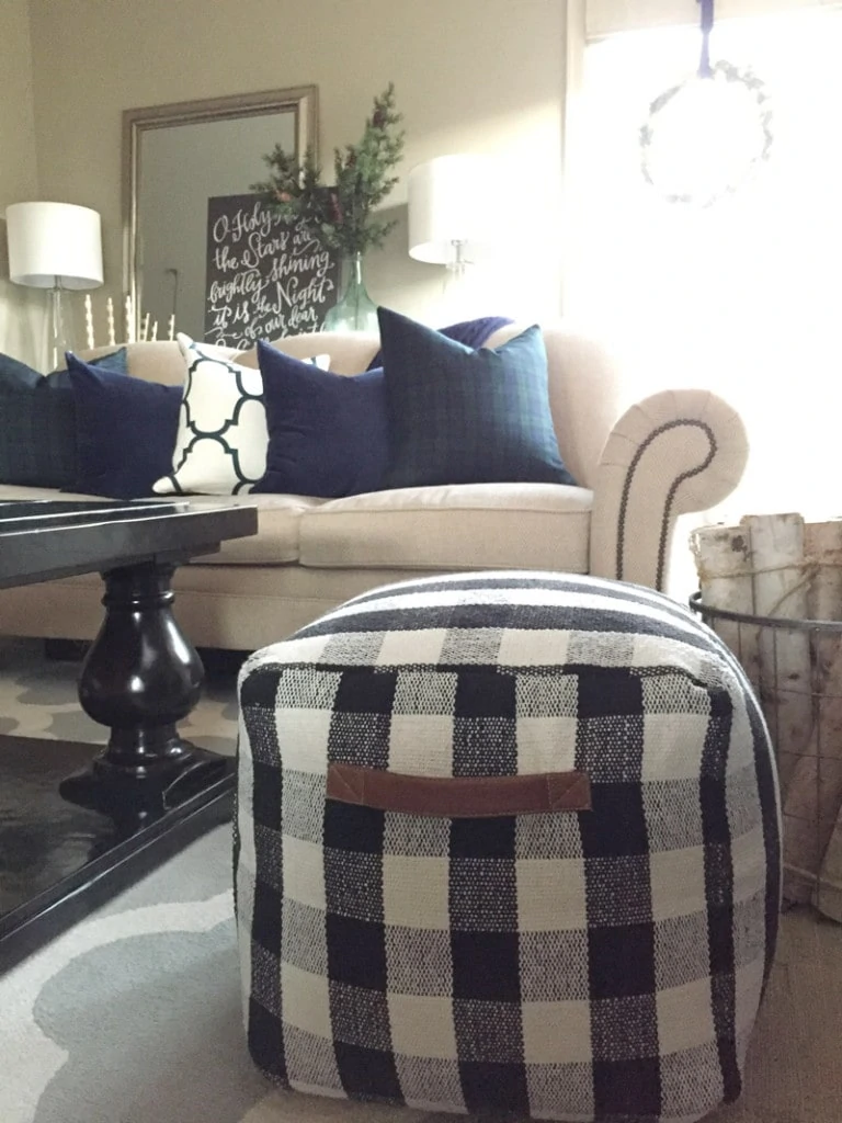 Winter livingroom accents--featuring navy blue pillows and a new buffalo checked pouf. 