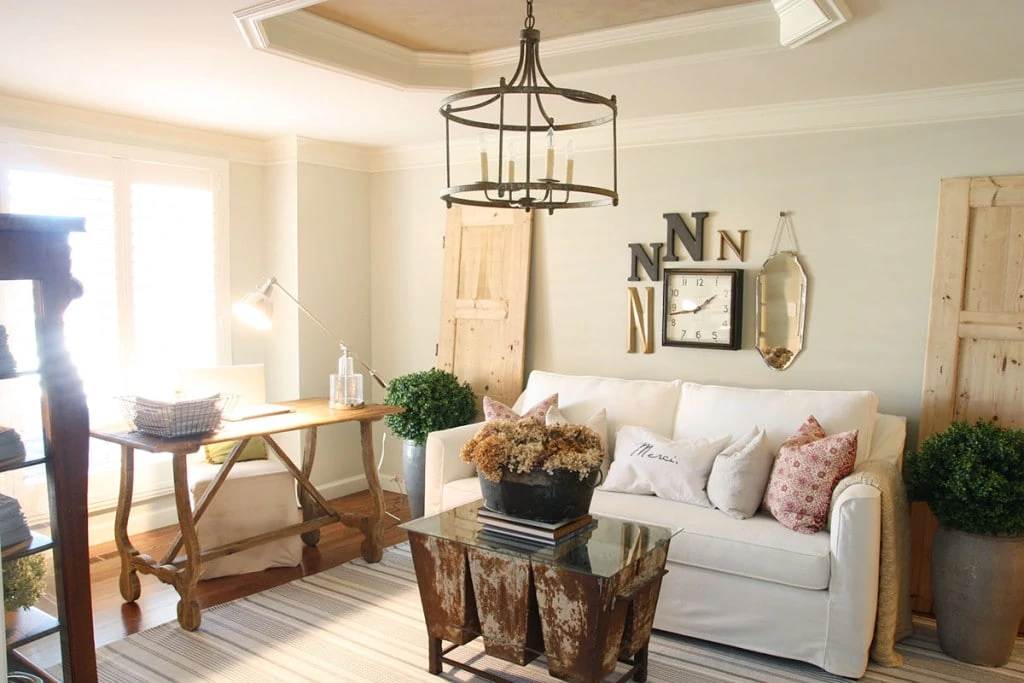 Front Room with rustic style. My favorite details are the barn doors and coffee table. Love the aged wood look and how much it adds to the style - Neutral Home Tour - Life On Virginia Street