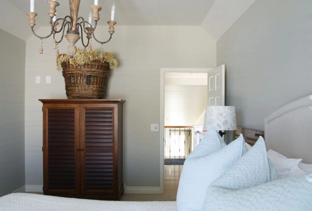 Guest Bedroom Bedding, wardrobe, and door into the hallway. - Neutral Home Tour - Life On Virginia Street