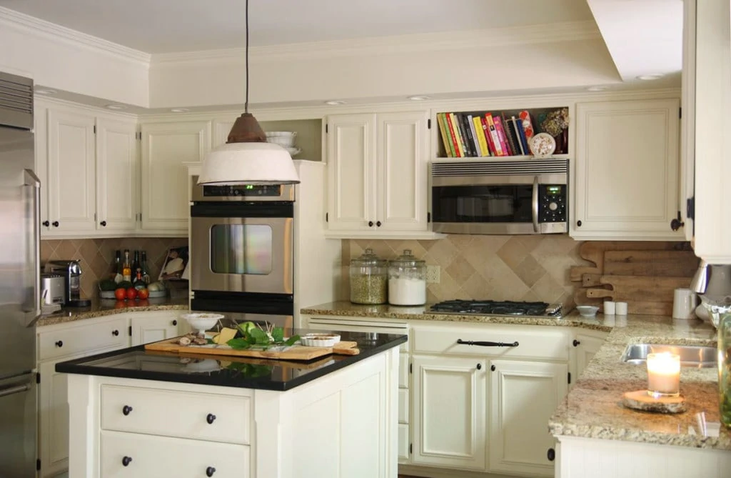 Kitchen with original oak cabinets, stripped and painted to update the look - Neutral Home Tour - Life On Virginia Street