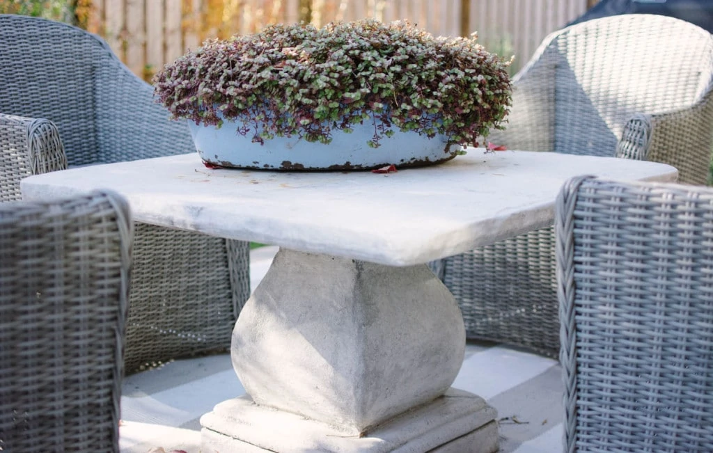 Patio Furniture, stone table and repurposed steel centerpiece. - Neutral Home Tour - Life On Virginia Street