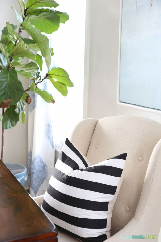 DIY Black and White Striped Pillows on the chairs in the dining room.